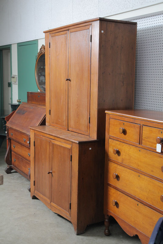 STEPBACK CUPBOARD. Walnut with four