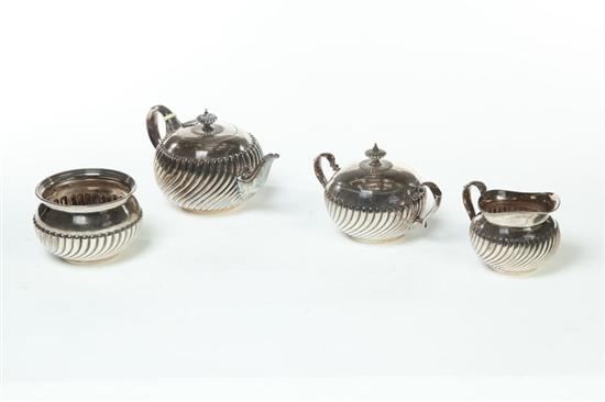 STERLING FOUR-PIECE TEA SET. 