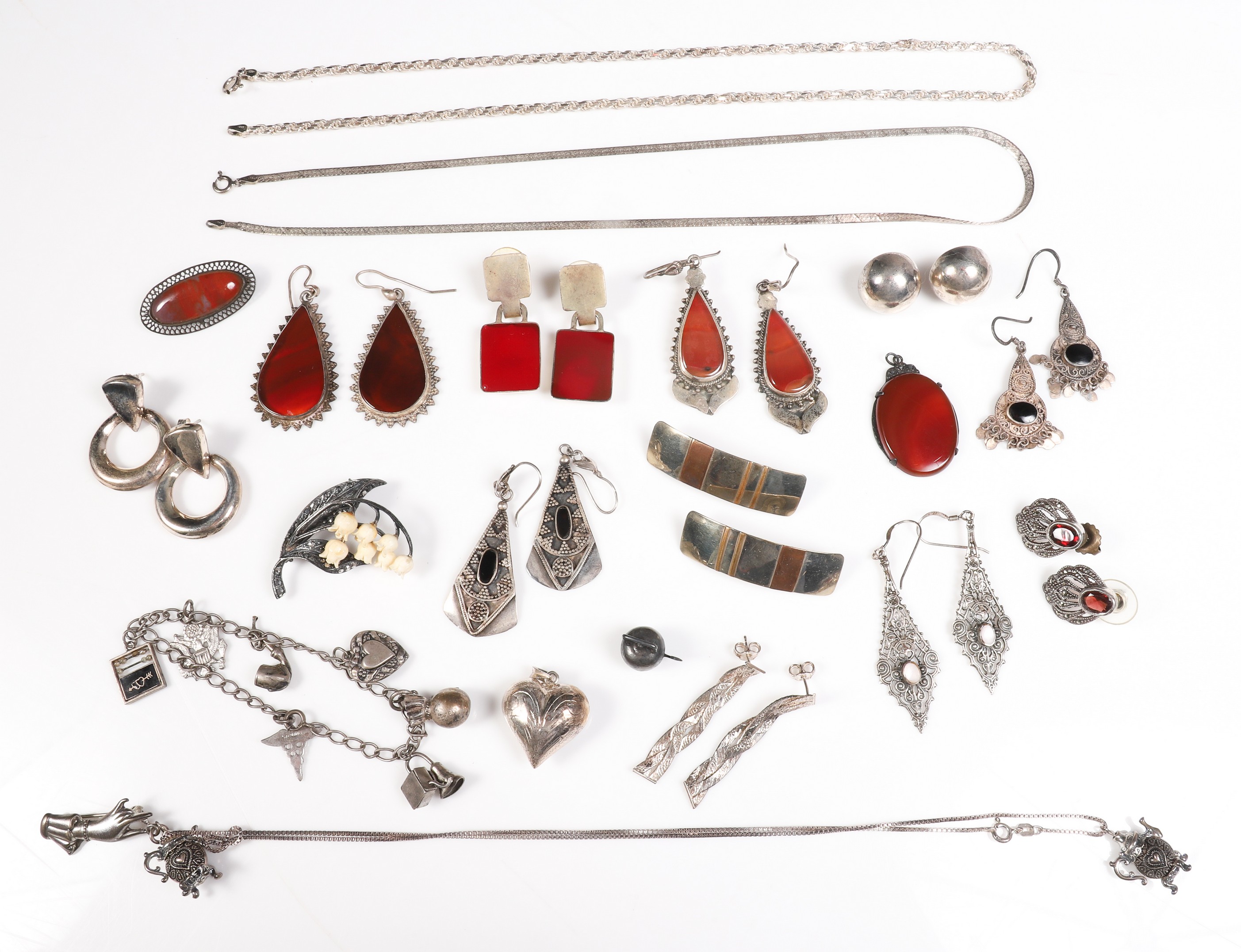 Sterling, marcasite and red stone