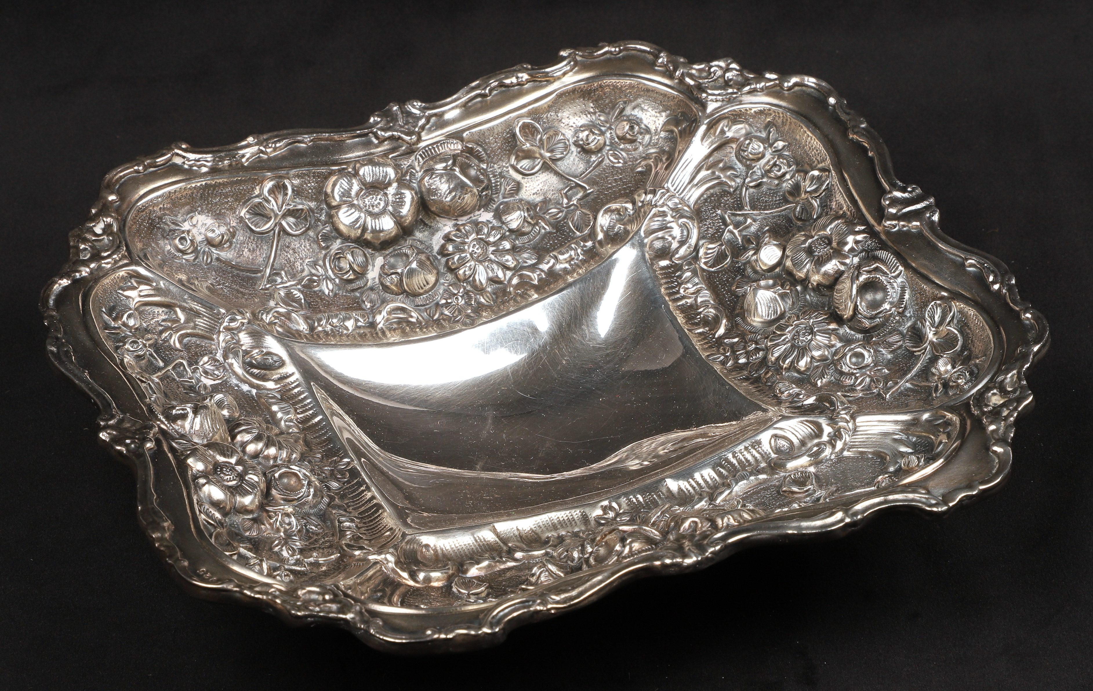 Sterling repousse footed bowl, in