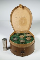STERLING SHOT GLASS SET IN LEA