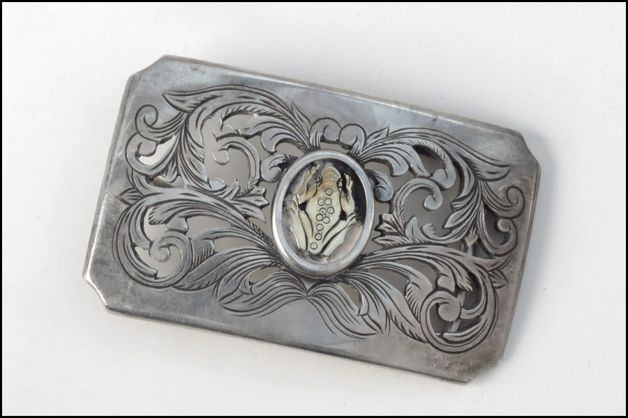 STERLING SILVER AND 18 KARAT YELLOW