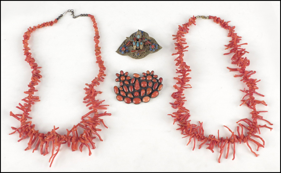 STERLING SILVER AND CORAL BROOCH.