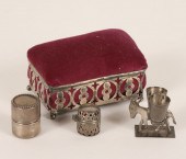 Sterling silver pin cushions,