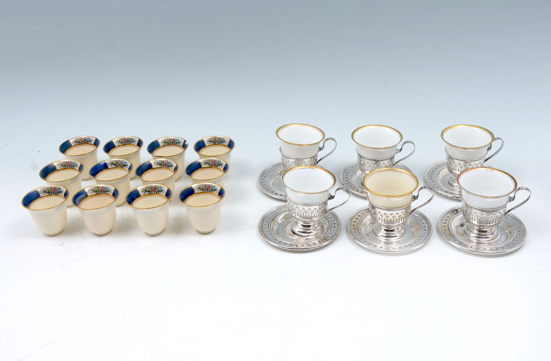 STERLING SILVER TEACUPS WITH