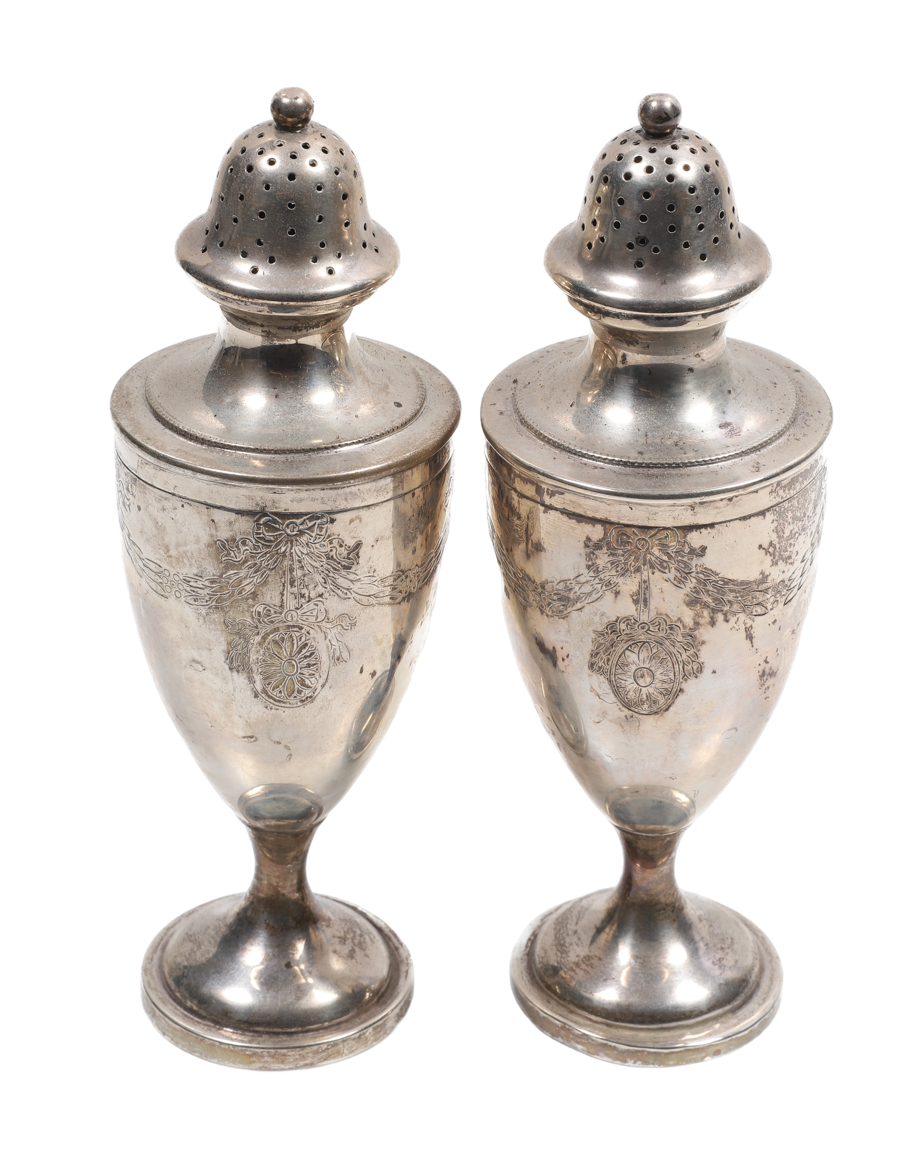 Sterling swag chased shaker pair,