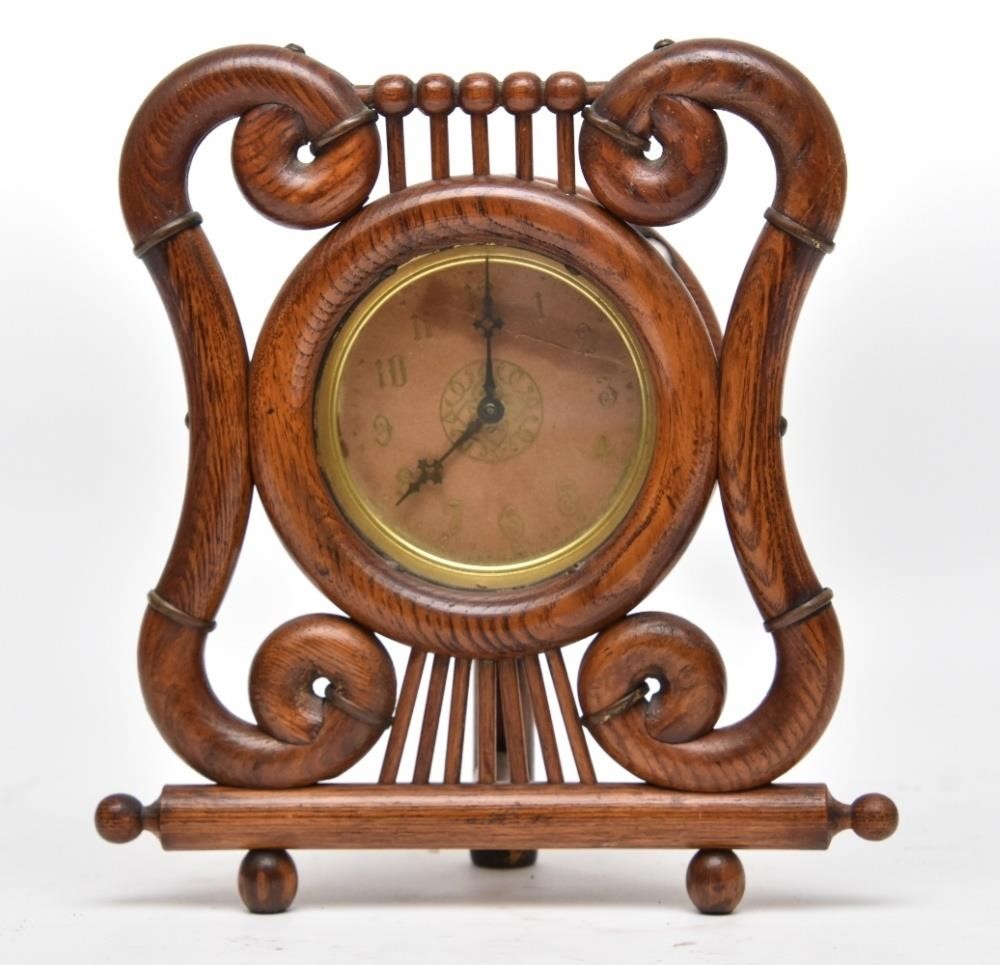 Stick and ball shelf clock by
