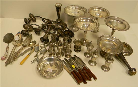 STLERING: Two candelabras  one in