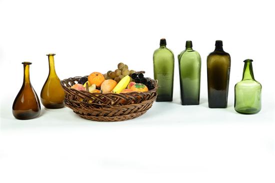STONE FRUIT AND SIX GLASS BOTTLES.
