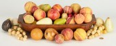 STONE FRUIT W/ CARVED WOOD BOW