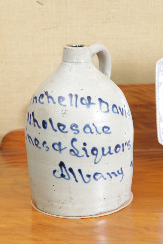 STONEWARE ADVERTISING JUG WITH