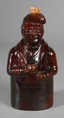 Stoneware figural flask, shaped