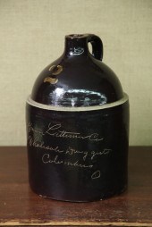 STONEWARE JUG. Albany slip gla