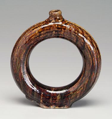 Stoneware ring jug, mottled dark