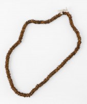 STRING OF AMBER-COLORED BEADS
