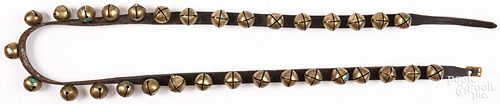 STRING OF BRASS SLEIGH BELLS,