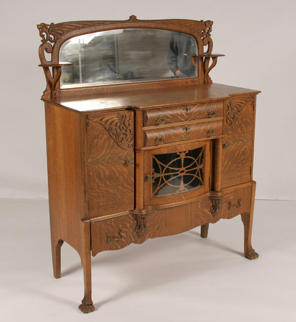 Stylish oak bow front server;