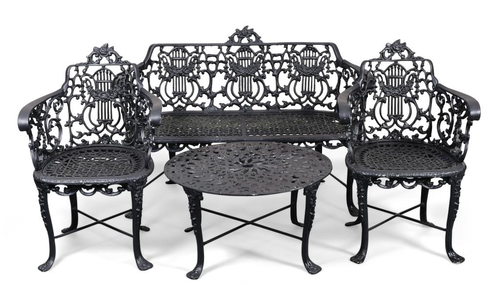 SUITE OF FOUR CAST METAL GARDEN