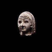 SUMERIAN HEAD OF A FEMALE WORS