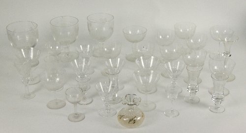 Sundry engraved champagne glasses