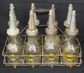 SUNOCO OIL BOTTLES WITH CARRIE