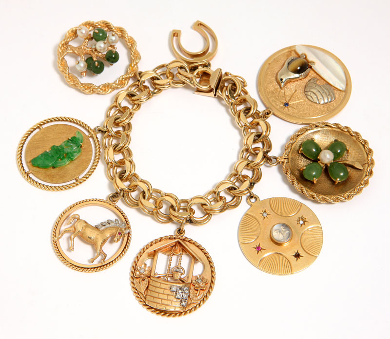 Suspending 8 stone and gold large