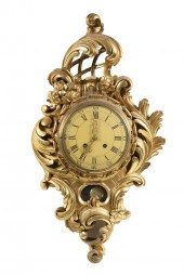 SWEDISH CARVED GILT WALL CLOCK