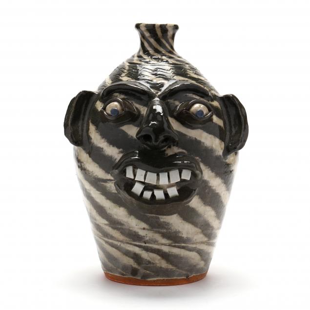 SWIRL CLAY FACE JUG, CHARLES LISK