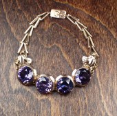 SYNTHETIC ALEXANDRITE AND GOLD
