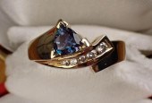 SYNTHETIC ALEXANDRITE AND GOLD