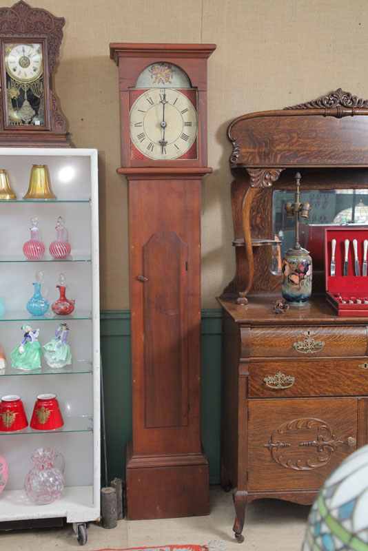 TALL CASE CLOCK. Wooden works and