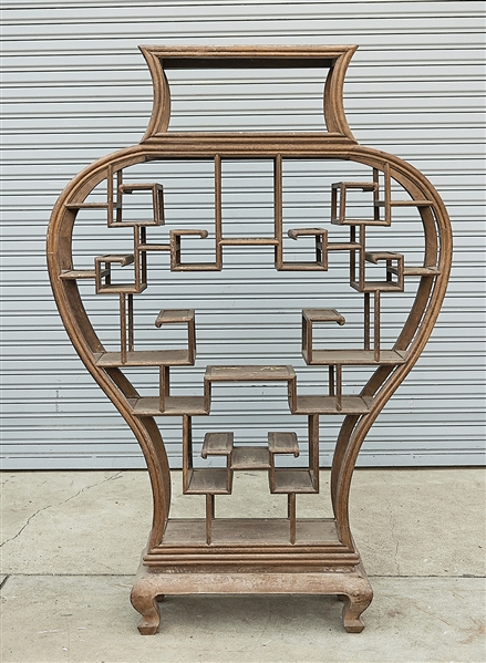 Tall Chinese wood curio shelves;