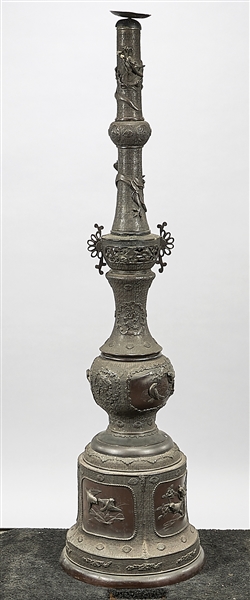 Tall Japanese metal candlestick;