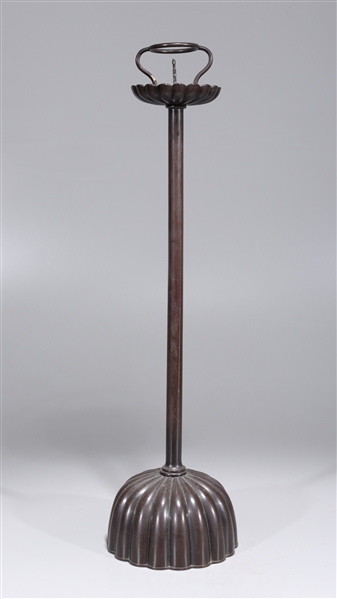 Tall metal candlestick with
