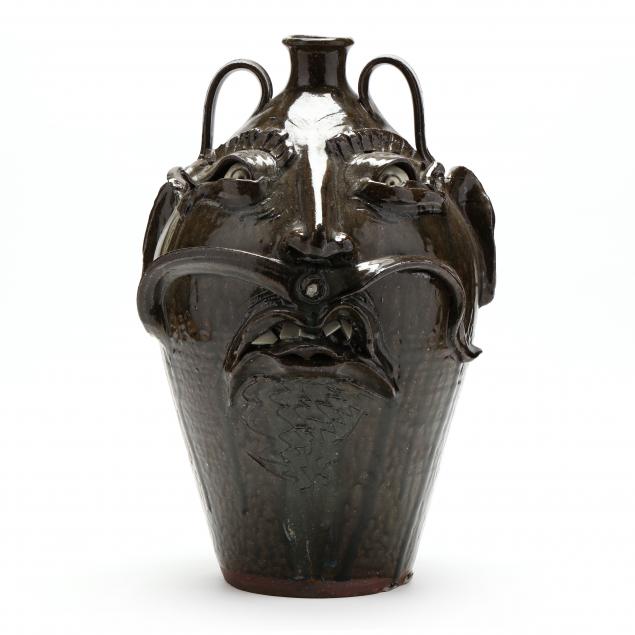 TALL SCOWLING FACE JUG, KIM
