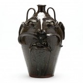 TALL SCOWLING FACE JUG, KIM EL