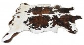 TANNED BROWN, BLACK & WHITE CO