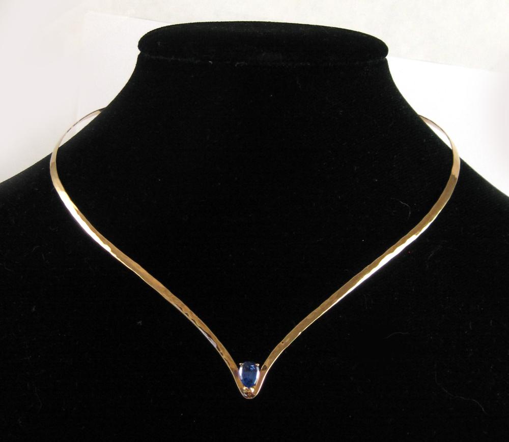 TANZANITE AND FOURTEEN KARAT GOLD