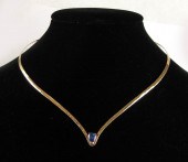 TANZANITE AND FOURTEEN KARAT G