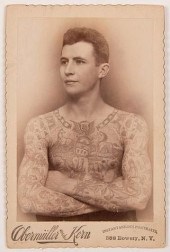 TATTOOED MAN SIDESHOW CABINET