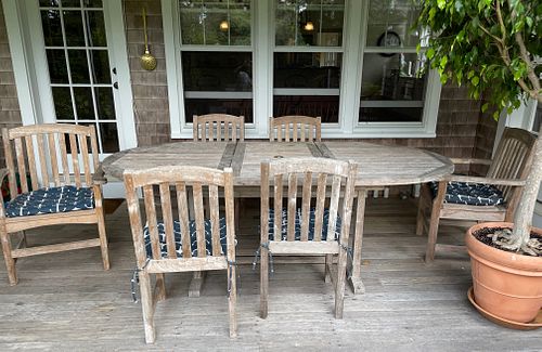 TEAK WOOD OVAL DINING TABLE AND SIX