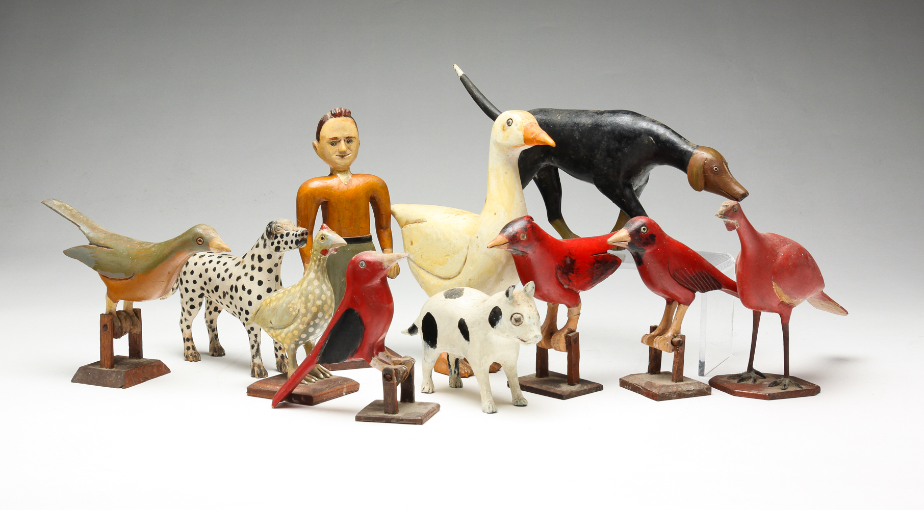 TEN AMERICAN FOLKSY CARVINGS. Mid