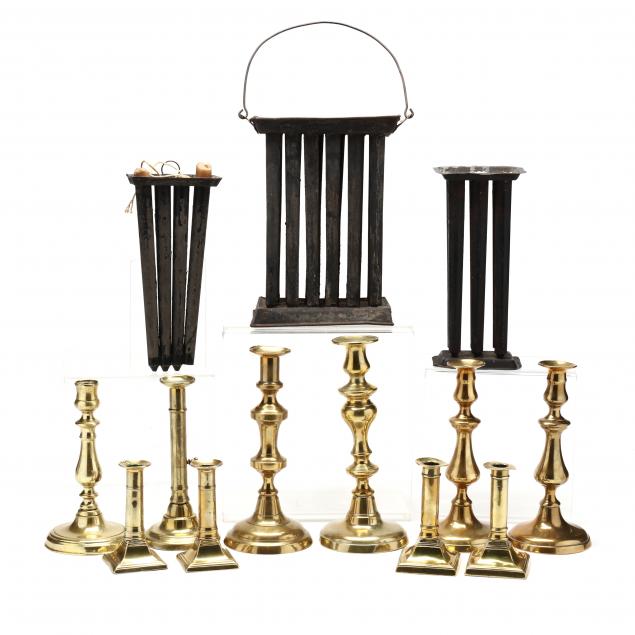 TEN ANTIQUE BRASS CANDLESTICKS