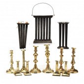 TEN ANTIQUE BRASS CANDLESTICKS