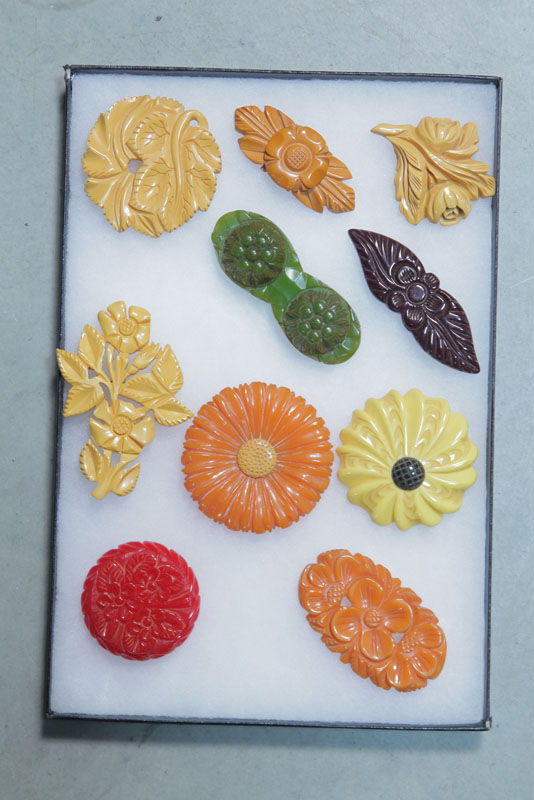 TEN BAKELITE PINS. All flowers 