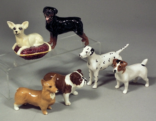Ten Beswick pottery figures of dogs