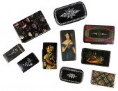 TEN BLACK LACQUERED SNUFF BOXE