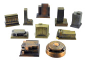 TEN CAST METAL COIN BANKS, ALL