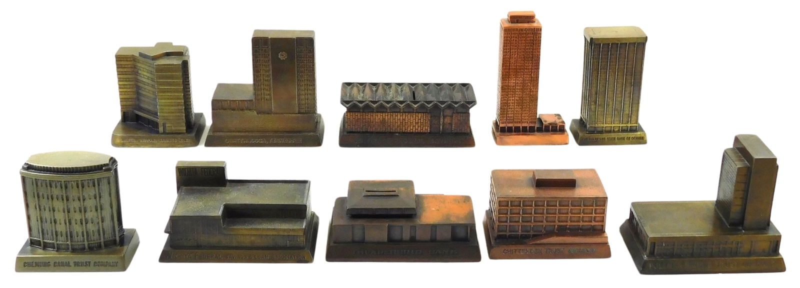 TEN CAST METAL COIN BANKS, ALL IN