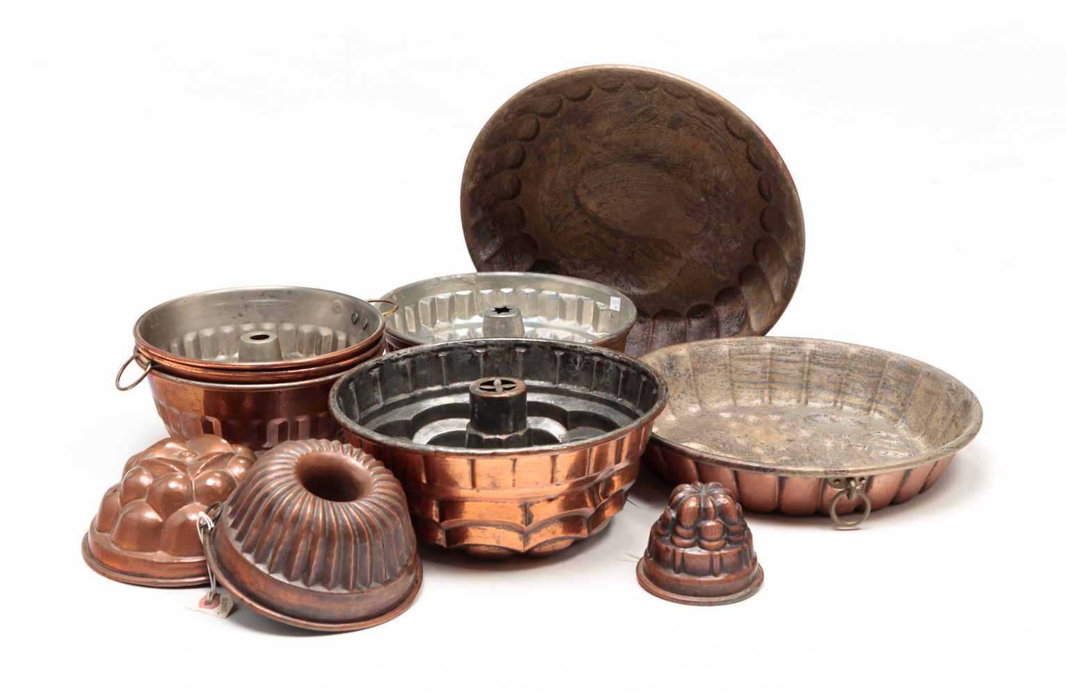 TEN COPPER FOOD MOLDS. Nineteenth